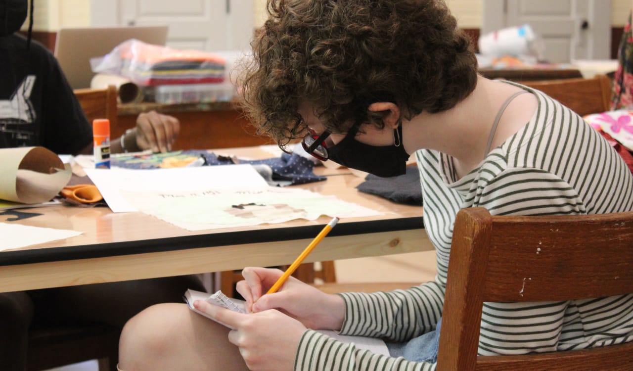 Abigail Blankenship working on a sketch for her quilt