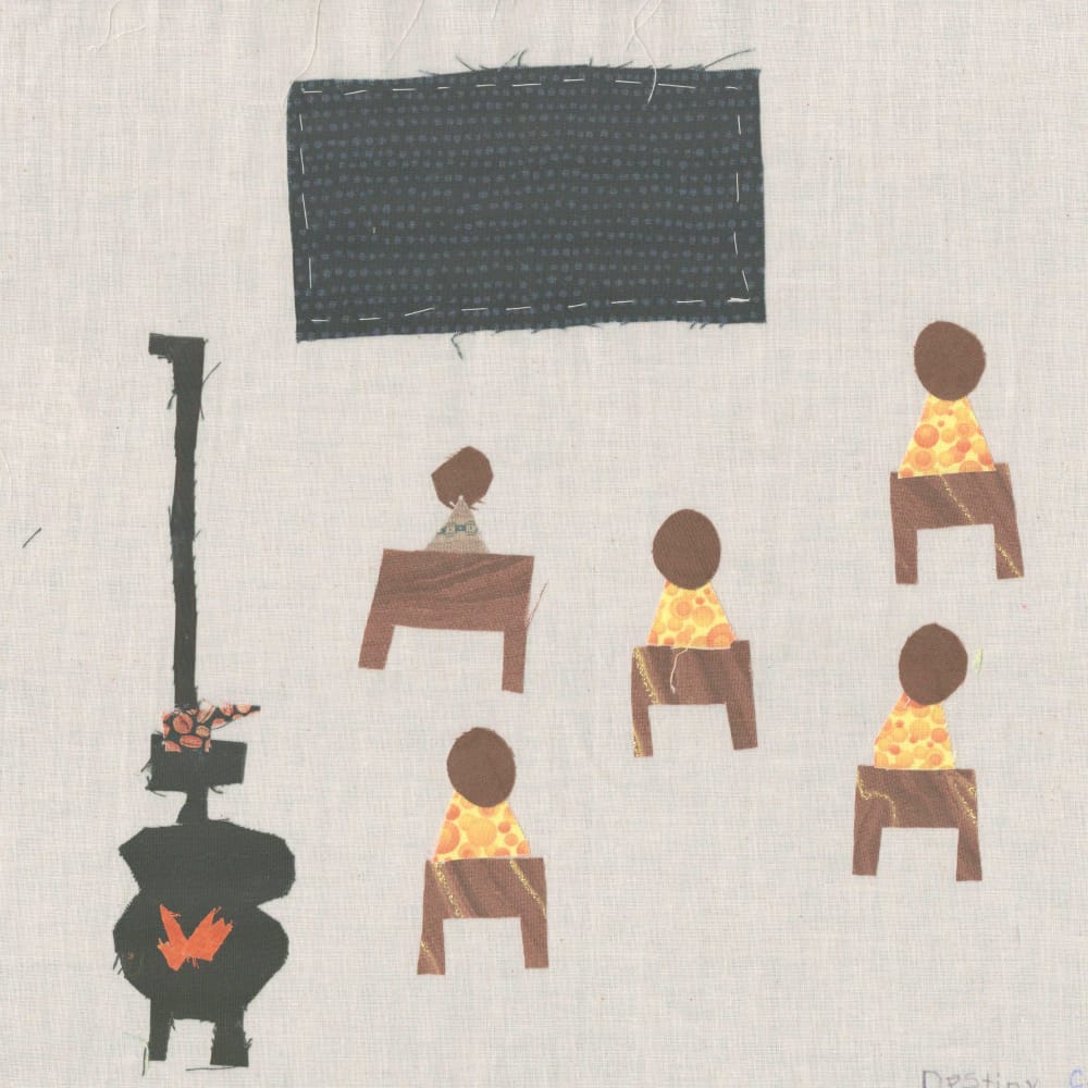 A quilt square depicting 5 African American children sitting at desks in front of a blackboard. A small wood stove is seen to the side.