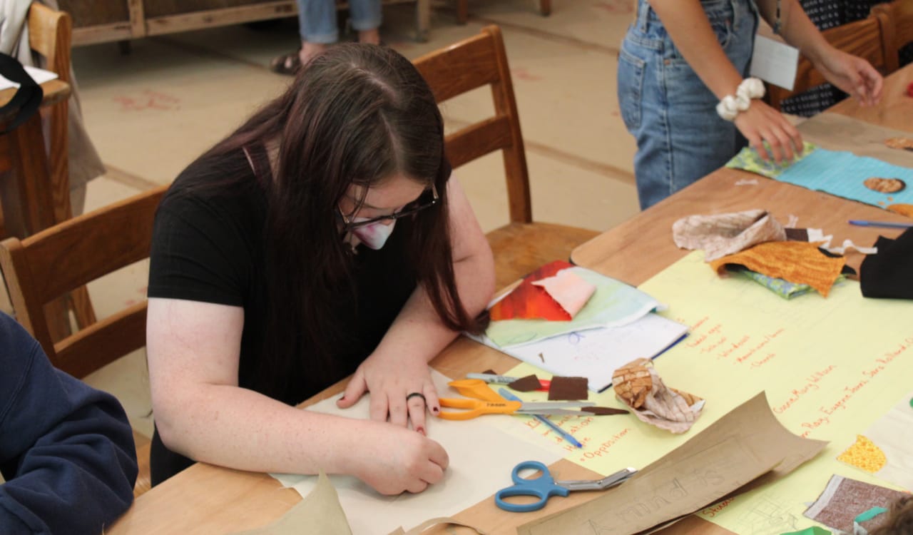 Wrenn working on her quilt square.